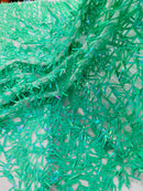 Sword Shaped Sequins - Jade Green - Hanging Iridescent Sequins On Mesh Fabric By Yard