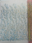 Beaded Iridescent Leaf Design - Clear on Light Pink - Leaf Sequins Bead Design Mesh Fabric by yard