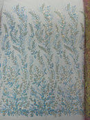 Beaded Iridescent Leaf Design - Clear on Light Pink - Leaf Sequins Bead Design Mesh Fabric by yard