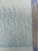 Beaded Iridescent Leaf Design - Clear on Lilac - Leaf Sequins Bead Design Mesh Fabric by yard