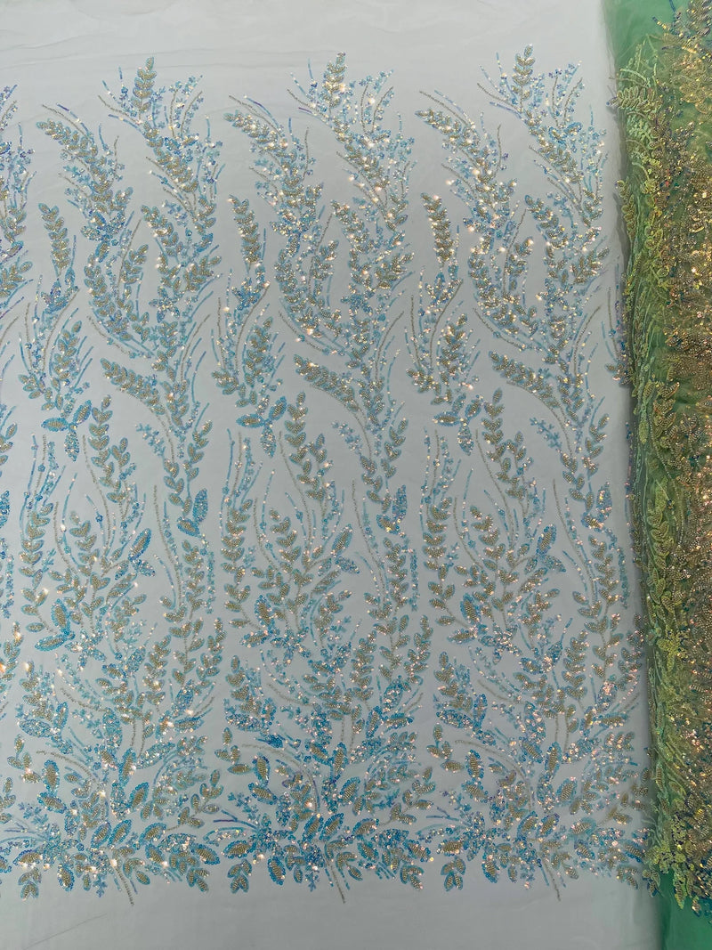 Beaded Iridescent Leaf Design - Clear on Mint Green - Leaf Sequins Bead Design Mesh Fabric by yard