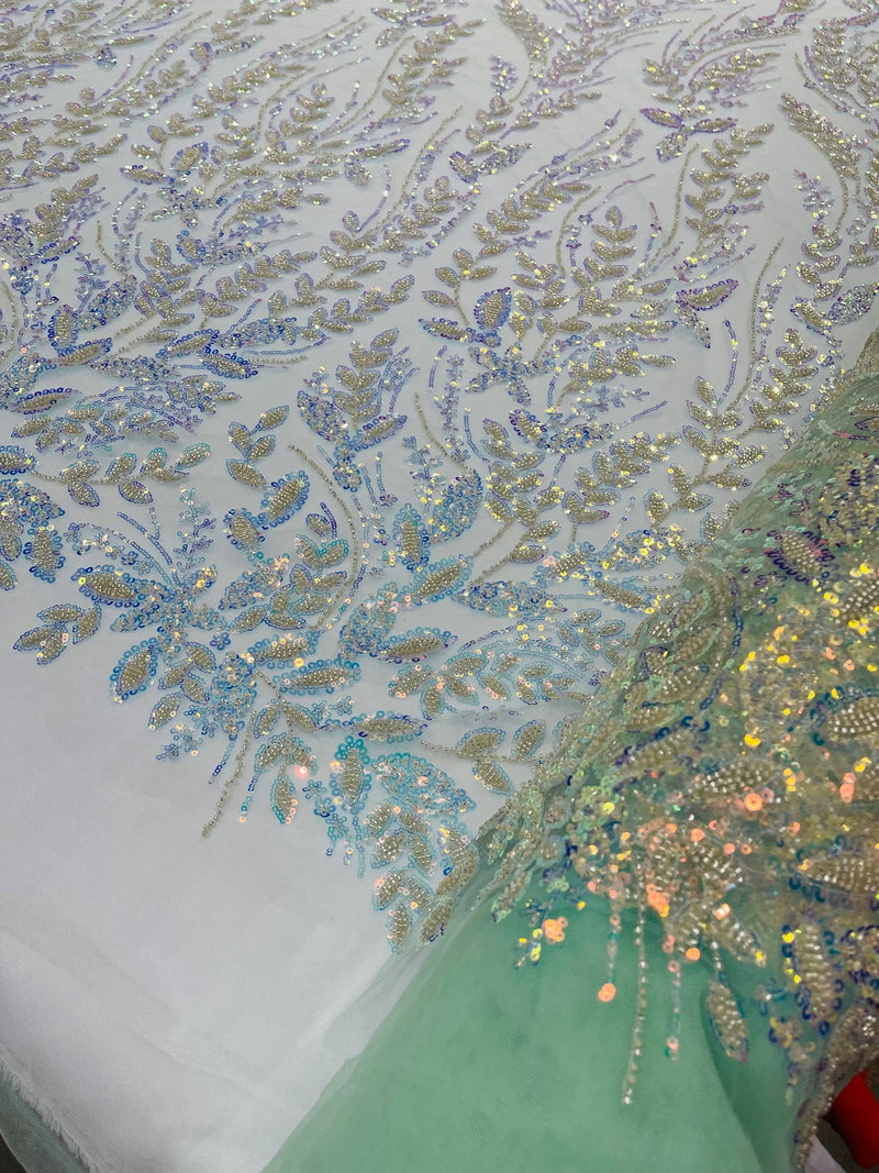 Beaded Iridescent Leaf Design - Clear on Mint Green - Leaf Sequins Bead Design Mesh Fabric by yard