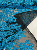 Big Damask Sequins - Turquoise Holographic on Black - Damask Sequin Design on 4 Way Stretch Fabric By Yard