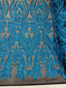 Big Damask Sequins - Turquoise Holographic on Black - Damask Sequin Design on 4 Way Stretch Fabric By Yard