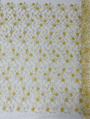 Metallic Floral Sequins Design - Metallic Gold Flowers With Ivory Leaves Embroidered on Ivory Tulle Sold By Yard