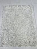 Floral Cluster Lace Fabric - White - Embroidered Flowers With Sequins on a Mesh Lace Fabric Sold By Yard