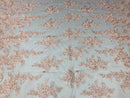 Pink Flower Lace Fabric - Floral Clusters Embroidered With sequins on a Mesh Lace Fabric Sold By The Yard