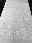 White Flower Lace Fabric - Floral Clusters Embroidered With sequins on a Mesh Lace Fabric Sold By The Yard