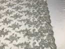 Silver Flower Lace Fabric - Floral Clusters Embroidered With sequins on a Mesh Lace Fabric Sold By The Yard