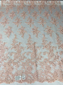 Pink Flower Lace Fabric - Floral Clusters Embroidered With sequins on a Mesh Lace Fabric Sold By The Yard