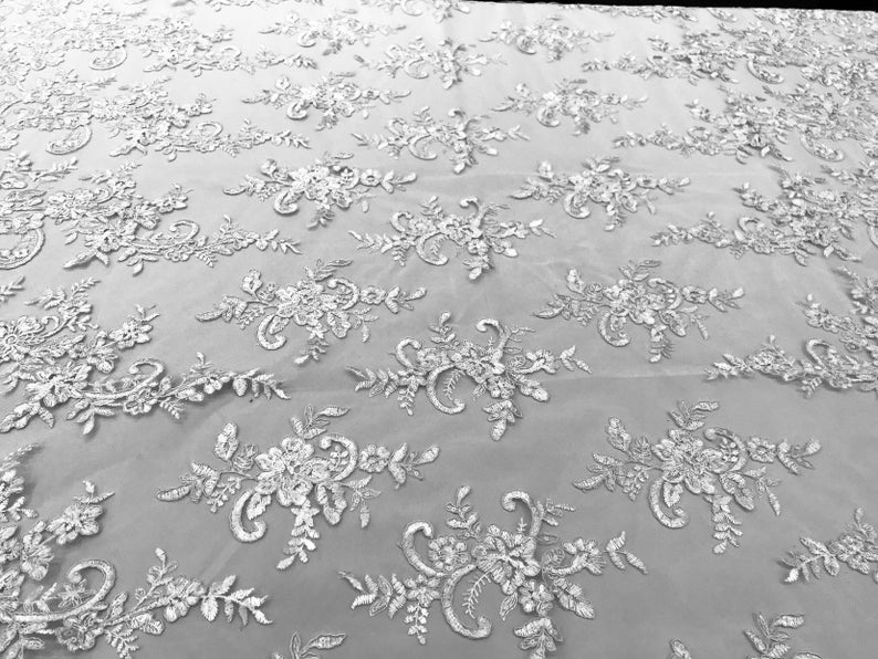 White Flower Lace Fabric - Floral Clusters Embroidered With sequins on a Mesh Lace Fabric Sold By The Yard